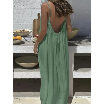 Robe dos nu ajustable NAÏADE Alba, robe d'été légère en tissu fluide avec décolleté dans le dos et bretelles fines.