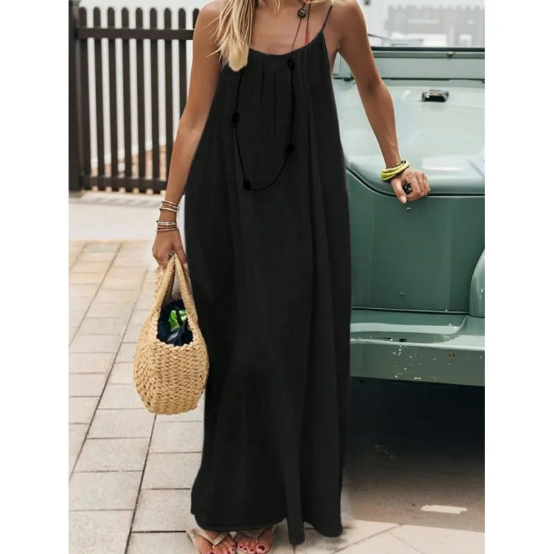 Robe dos nu ajustable Alba de la marque NAÏADE, vêtement d'été léger avec décolleté dans le dos et bretelles fines.