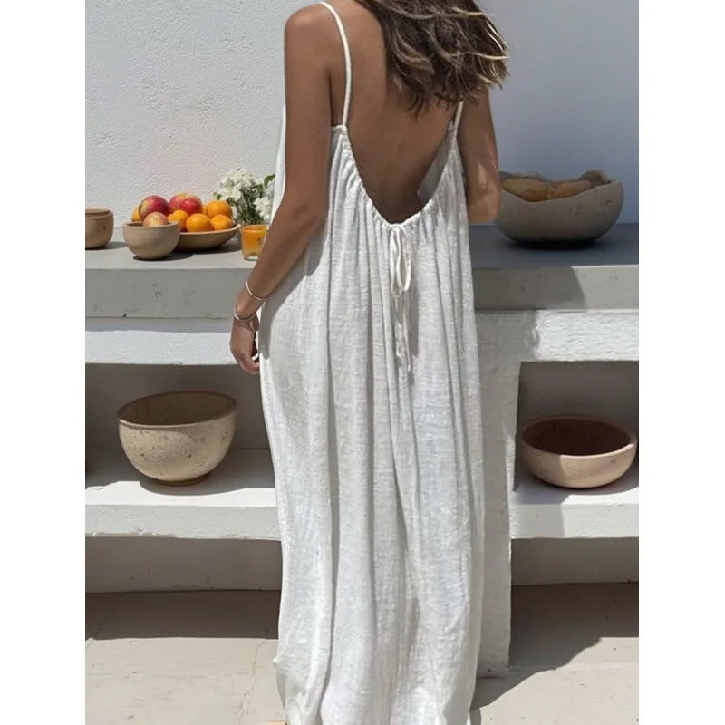 Robe dos nu ajustable NAÏADE Alba, vêtement élégant en tissu léger, avec dos nu et design ajustable.