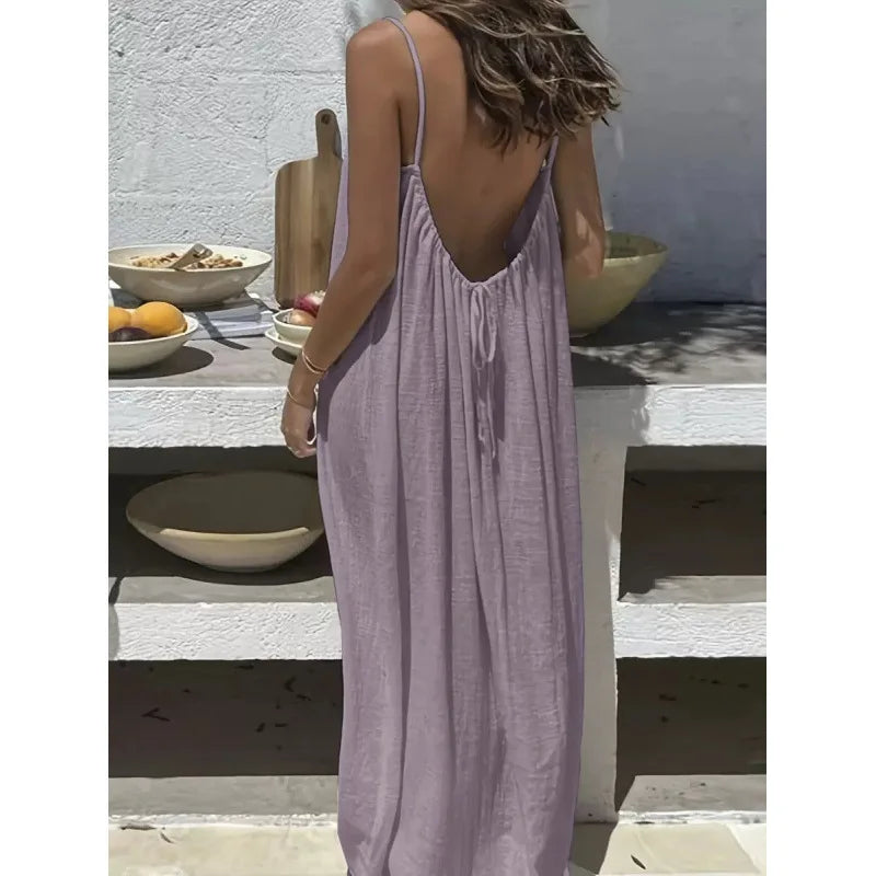 Robe dos nu ajustable NAÏADE Alba, robe d'été légère avec décolleté dans le dos et bretelles fines, tissu fluide et élégant.